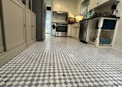 Custom blue and white checkers ceramic tile floor installation by Bystone in Birmingham, AL.