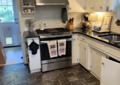 Before photo of an outdated kitchen with linoleum floor and remodel left incomplete by a previous contractor in Hoover AL.